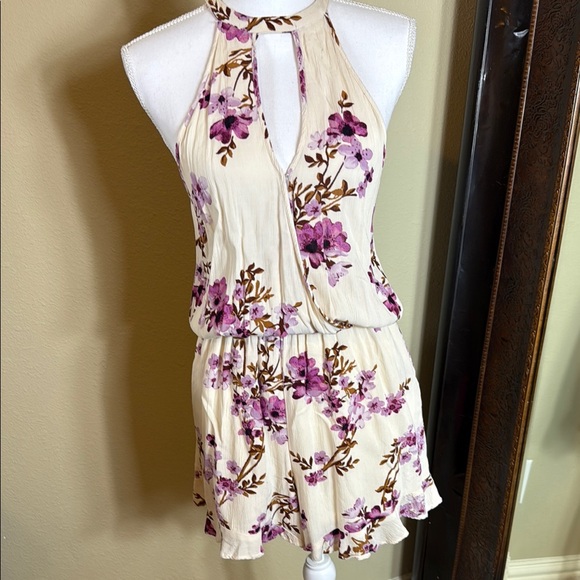 American Eagle Outfitters Pants - American Eagle Outfitters Floral Romper in Cream and purple size medium